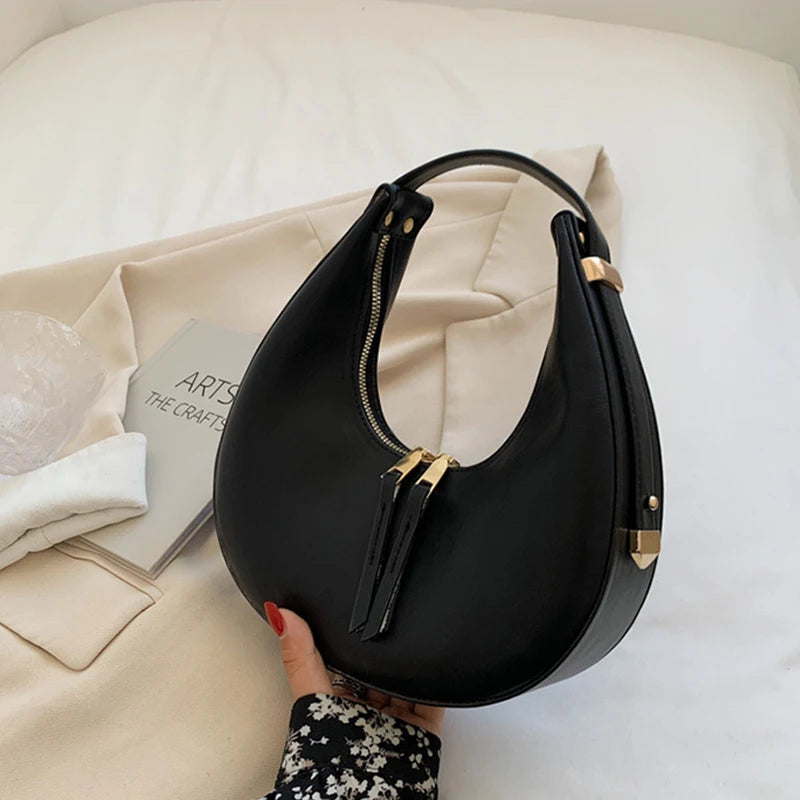 Crescent-shaped leather hobo bag
