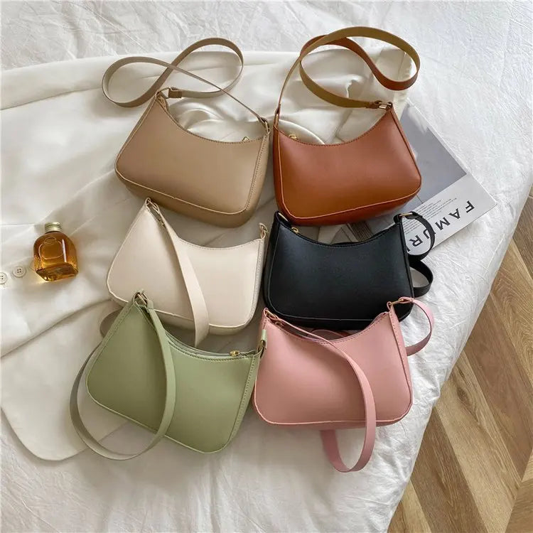 Minimal leather sling crossbody