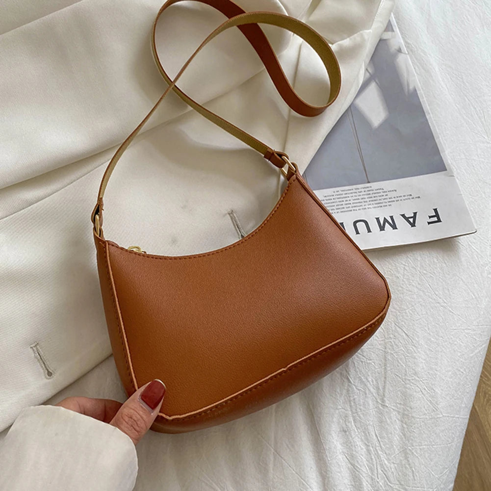 Minimal leather sling crossbody