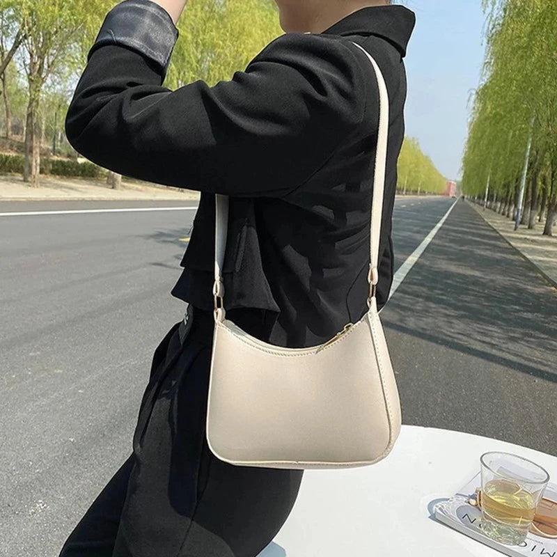 Minimal leather sling crossbody