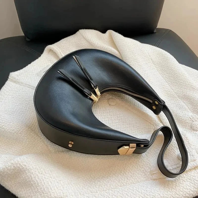 Crescent-shaped leather hobo bag