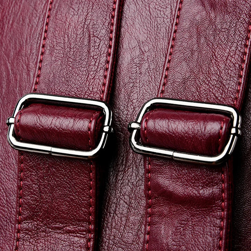 Leather knapsack with secure top flap
