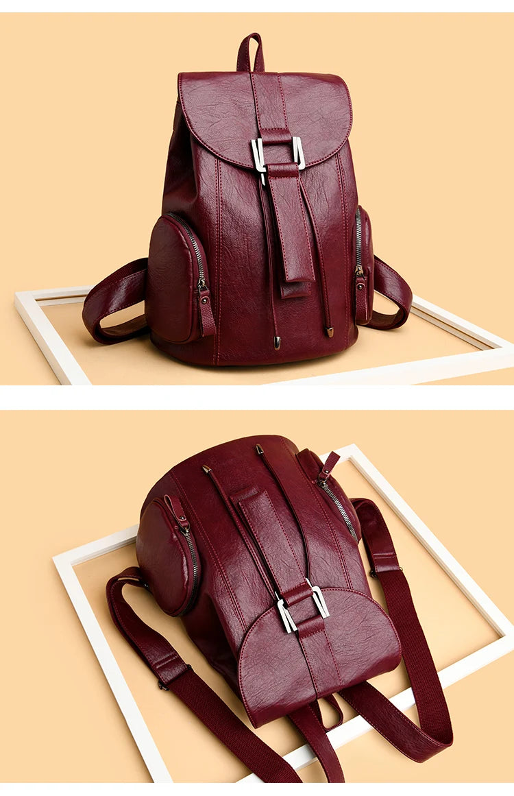 Leather knapsack with secure top flap