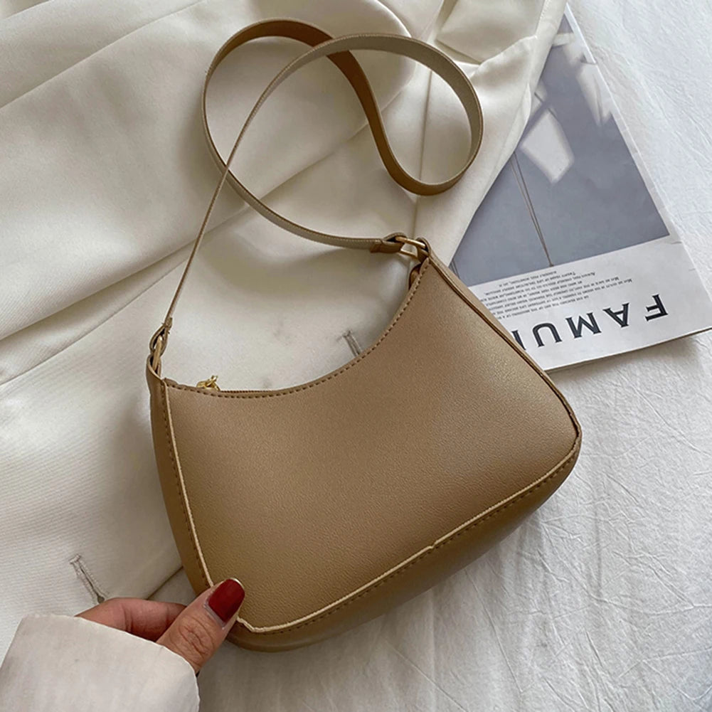 Minimal leather sling crossbody