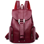 Leather knapsack with secure top flap