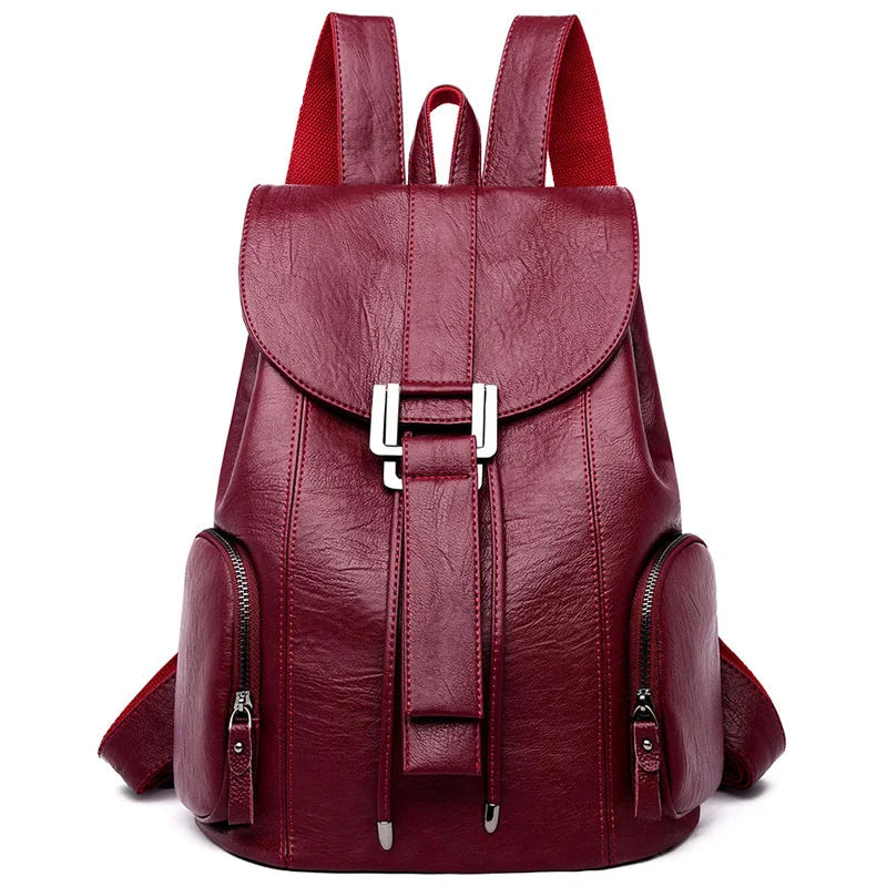 Leather knapsack with secure top flap