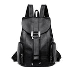 Leather knapsack with secure top flap