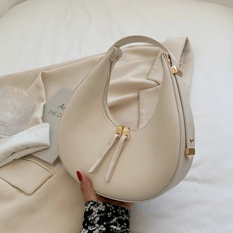 Crescent-shaped leather hobo bag