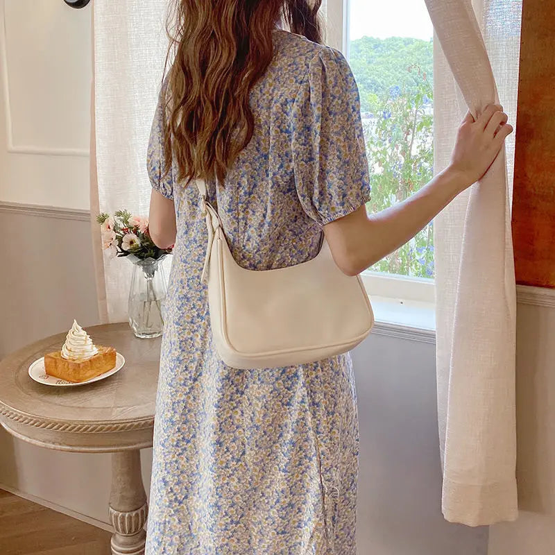 Minimalist leather shoulder bag for women