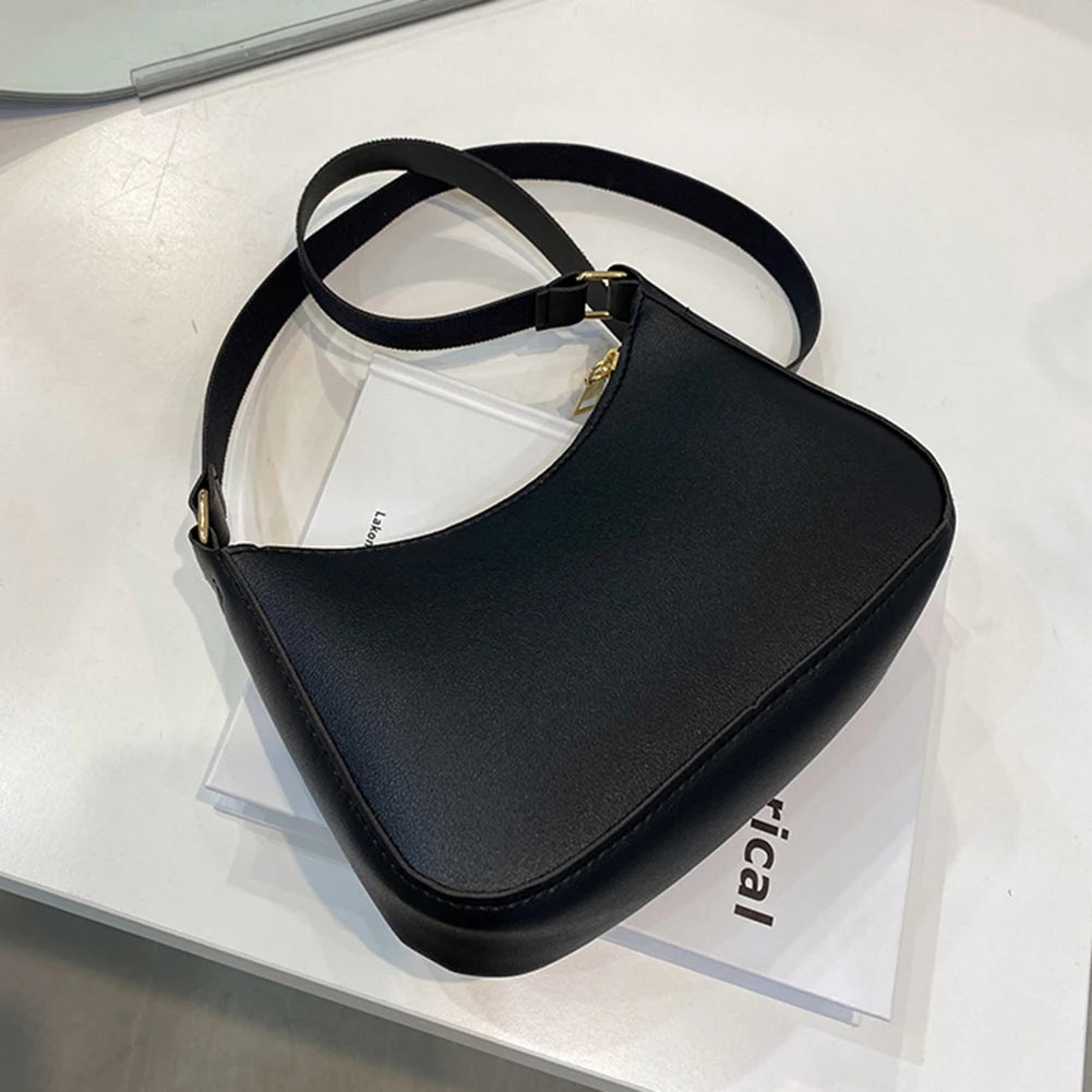 Minimal leather sling crossbody