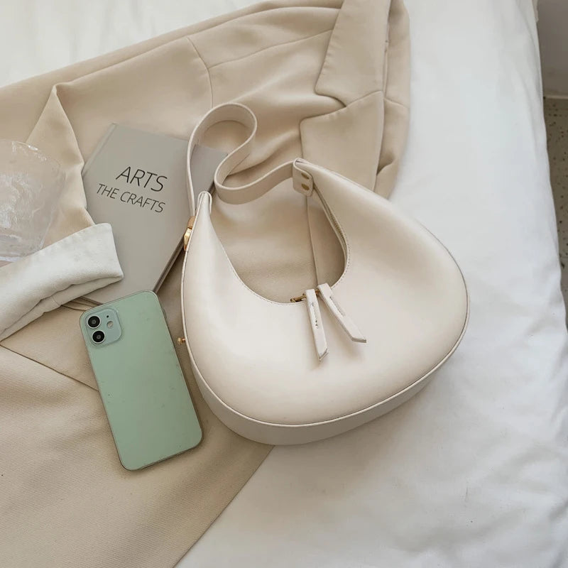 Crescent-shaped leather hobo bag