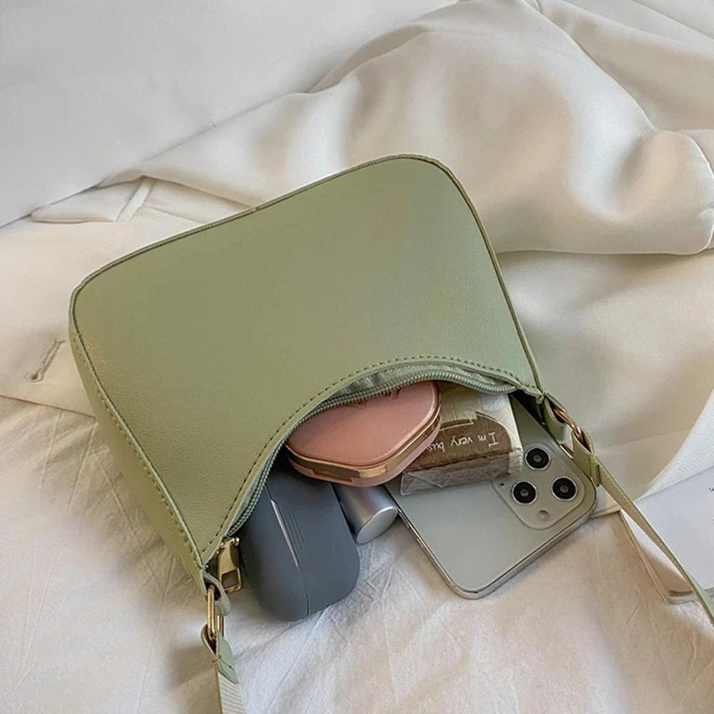 Minimal leather sling crossbody