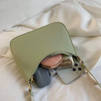 Minimal leather sling crossbody