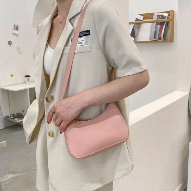 Minimal leather sling crossbody