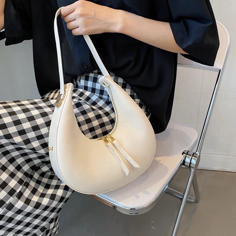 Crescent-shaped leather hobo bag