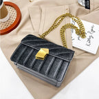 Corduroy handbag with chain and flap closure