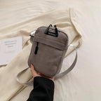 Compact corduroy crossbody bag