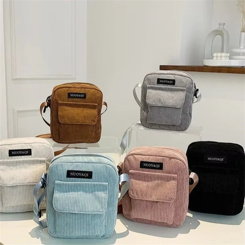 Corduroy crossbody handbag with front pocket