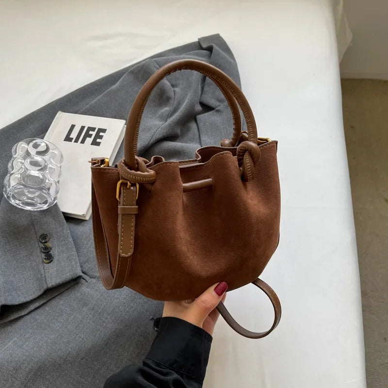 Everyday suede handbag with strap