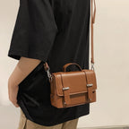 Compact leather crossbody bag