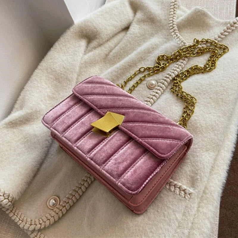 Corduroy handbag with chain and flap closure