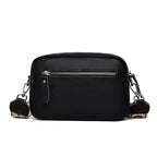 Textured leather crossbody bag