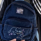 Cat-embroidered denim backpack