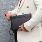 Compact leather clutch for essentials
