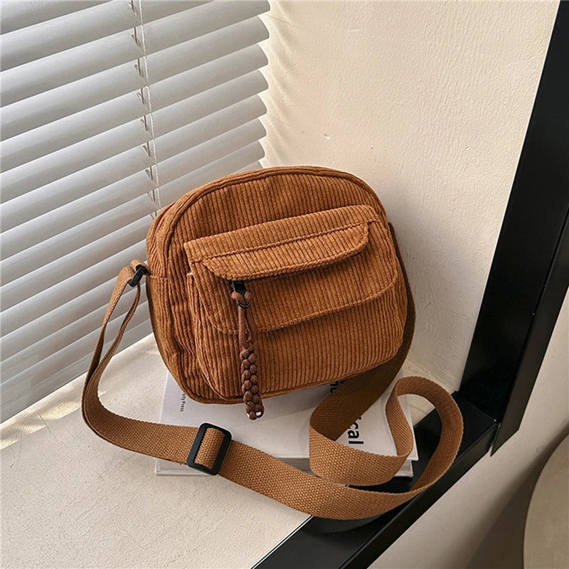 Small corduroy handbag with front zipper pocket
