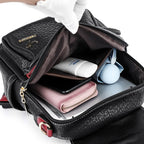 Contrast-strap leather backpack