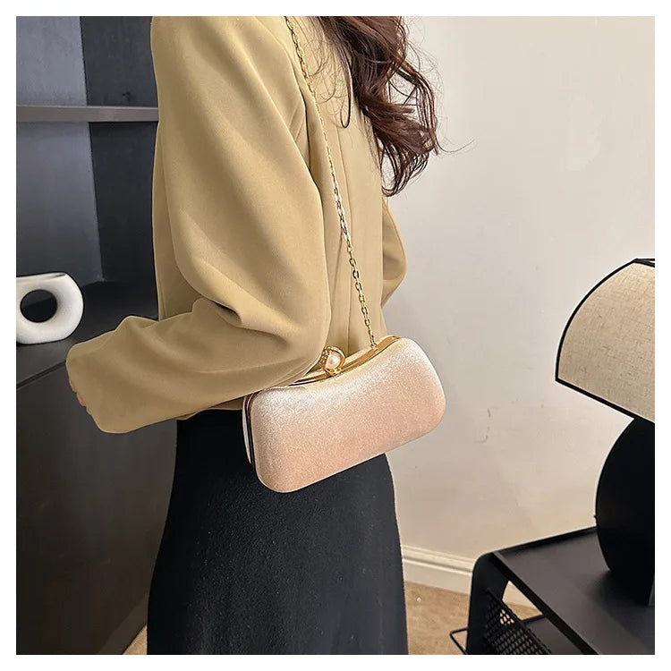 Corduroy clutch bag with  chain strap