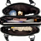 Leather handbag with detachable shoulder strap