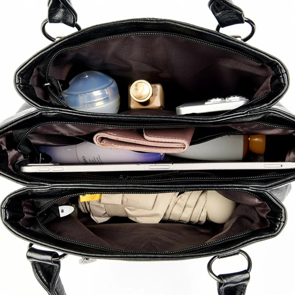 Leather handbag with detachable shoulder strap