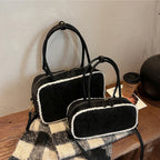 Elegant suede handbag with vintage charm