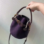 Small brown corduroy handbag with top handle