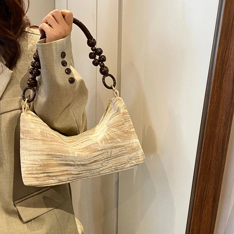 Corduroy handbag with wooden bead handle