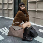 Suede handbag with subtle colors