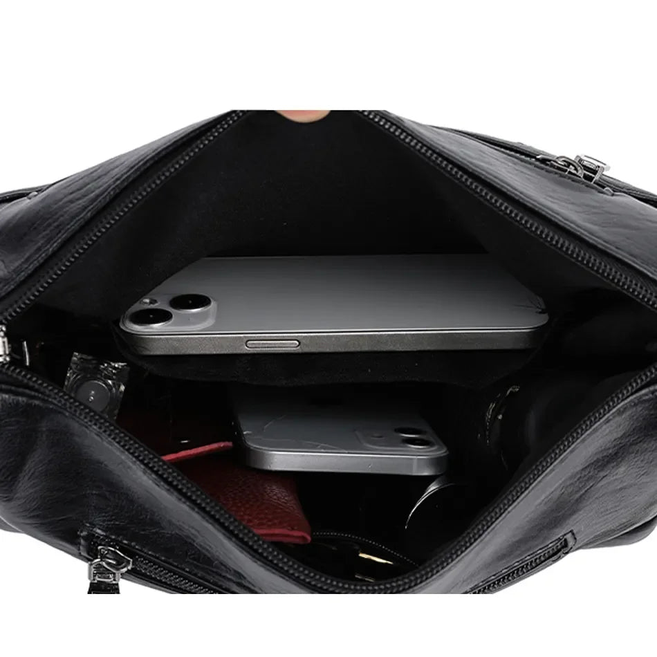 Leather shoulder bag with adjustable strap