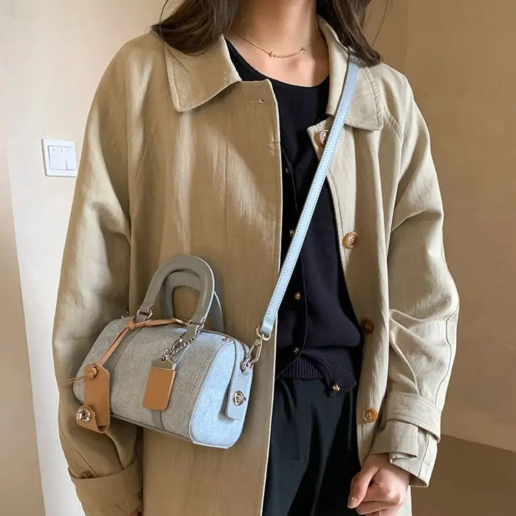 Structured denim crossbody handbag