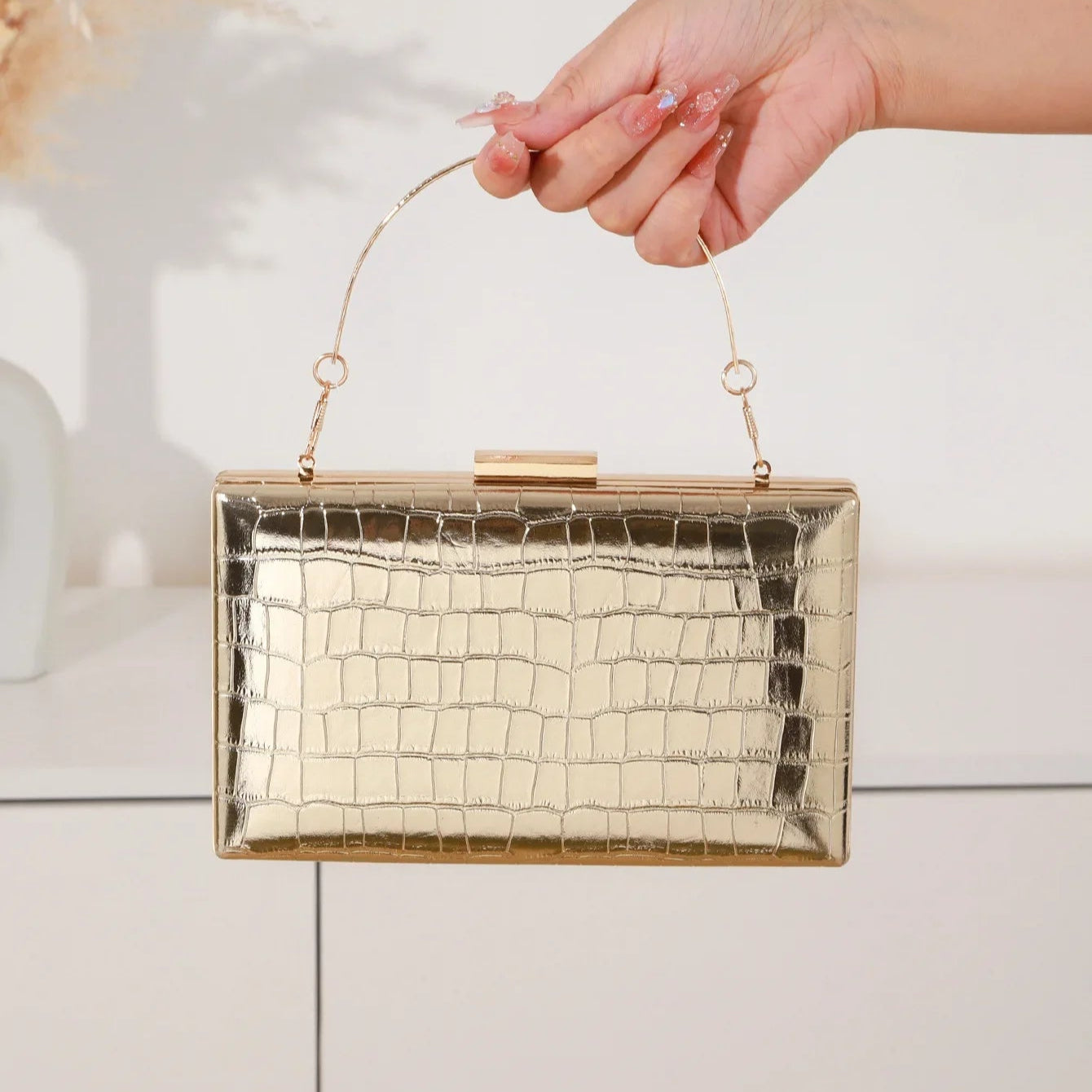 Leather handbag with structured silhouette