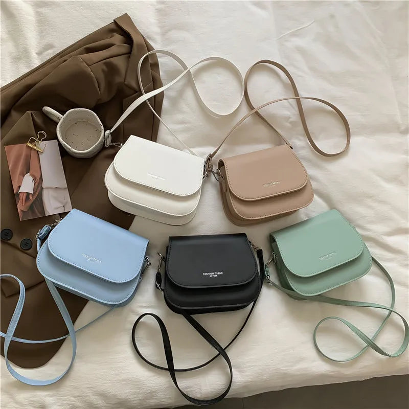 Compact leather sling crossbody