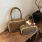 Elegant suede handbag with vintage charm