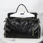 Elegant leather holdall with shoulder strap