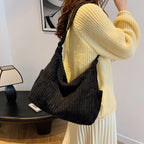 Versatile corduroy handbag with shoulder strap