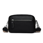 Textured leather crossbody bag