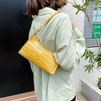 Small leather sling pouch
