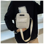 Corduroy crossbody handbag with front pocket