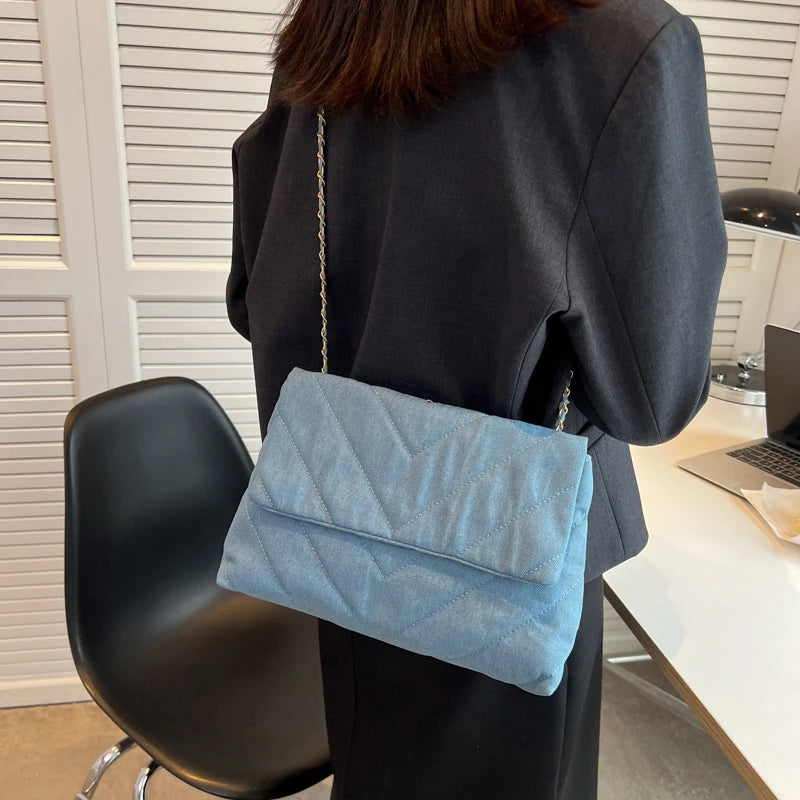 Flap-style denim shoulder handbag