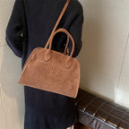 Suede handbag with shoulder strap