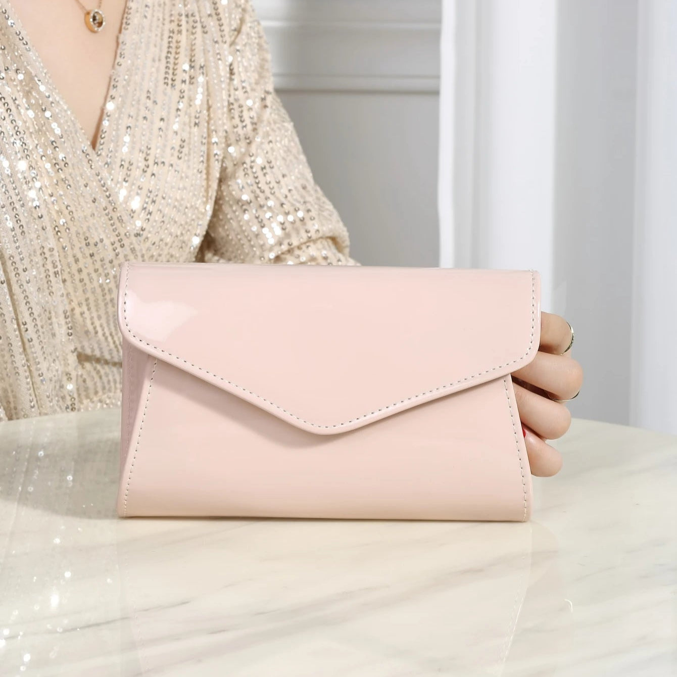 Minimal leather handbag with slim profile